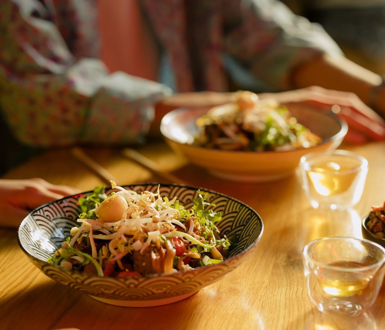 Bowl of Noodles on Wooden Table